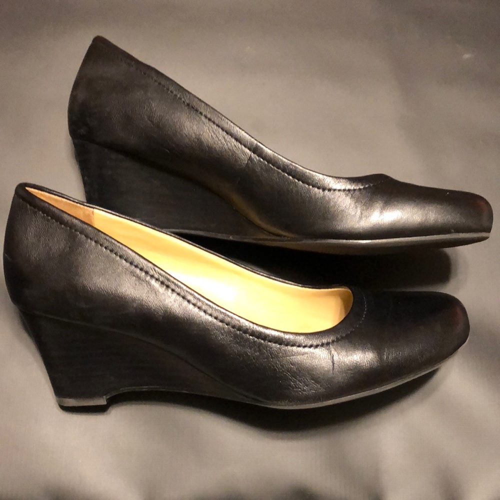 Black leather Naturalizer wedge heels shoes.